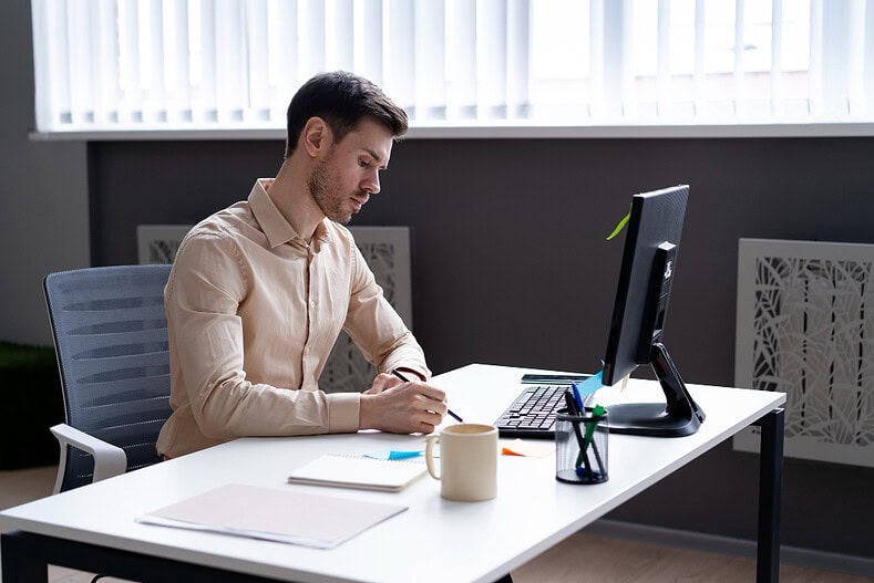 Marketer studying online for the GoHighLevel certification exam